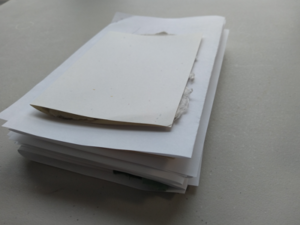 scrap paper or parchment paper between